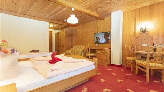 Triple room "Noriker" with pine wood ceiling, balcony